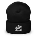 AC Agilis Cultus cuffed beanie in black, front view, snug fit with folded cuff, soft knit fabric, minimalist black and white aesthetic